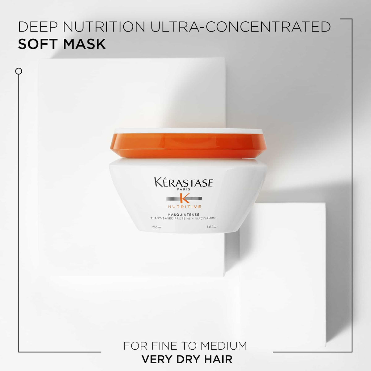 KÉRASTASE Masquintense jar held in hand to show 6.8 fl oz size and portability