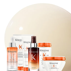 KÉRASTASE conditioner on a styled bathroom shelf conveying everyday luxury and routine use
