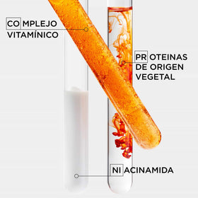 KÉRASTASE product next to a ruler to show bottle size and travel-friendly scale