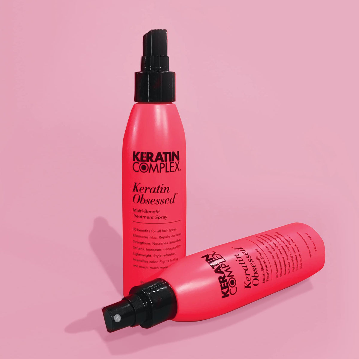 Keratin Complex bottle next to hand for scale and travel-friendly 5 fl oz benefit