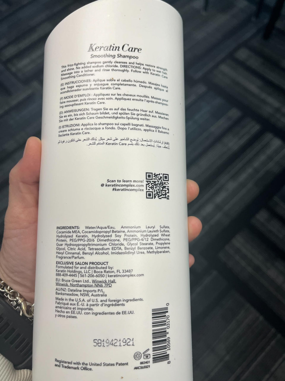Keratin Complex duo beside a ruler showing 33.8 fl oz scale benefit