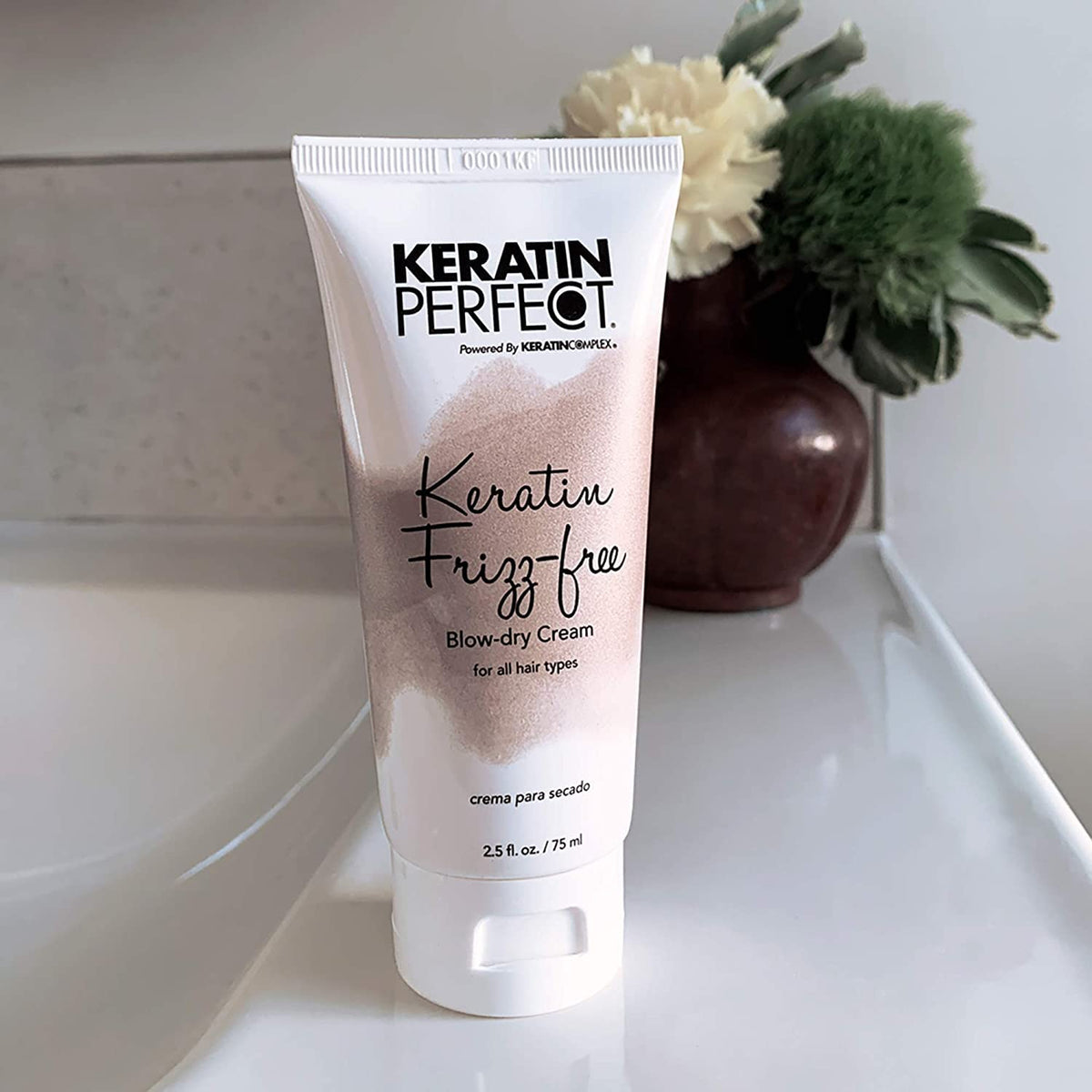 Keratin Perfect label close-up emphasizing keratin and rosemary ingredients for improved manageability