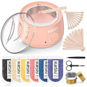 KeShi wax warmer beside hand for scale showing compact, home-friendly size