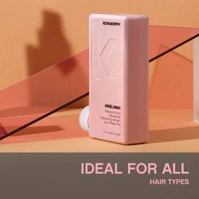 KEVIN.MURPHY ANGEL.WASH beside a ruler showing 250 ml scale for size and travel planning