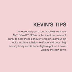 KEVIN.MURPHY bottle in hand showing size and portability benefit