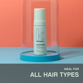 KEVIN.MURPHY 150ml bottle next to a ruler to show product size and travel-friendly benefit