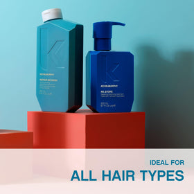KEVIN.MURPHY RE.STORE bottle beside a hairbrush for repair-ready styling