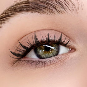 KEYYOU model wearing lashes showing manga-style lift and expressive eyes