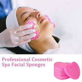 kickleen sponge in hand to show scale and ergonomic cleansing benefit