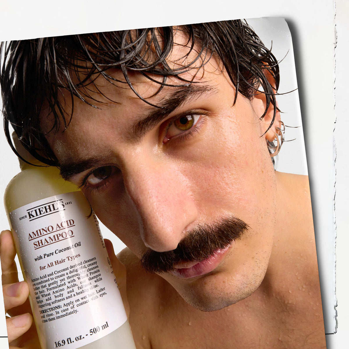 Wet hair after rinsing showing Kiehl's softness and lightweight volume result