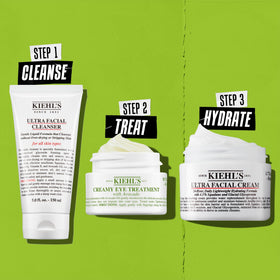Lifestyle bathroom shelf with Kiehl's jar among skincare items portraying daily routine use