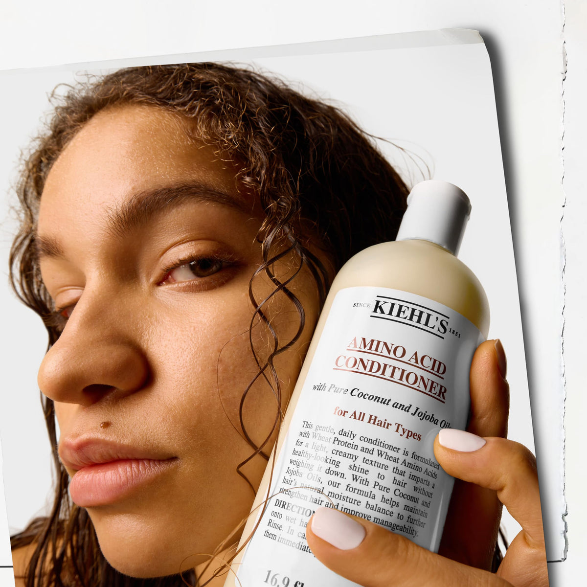 Kiehl's conditioner on bathroom shelf in lifestyle scene for everyday use