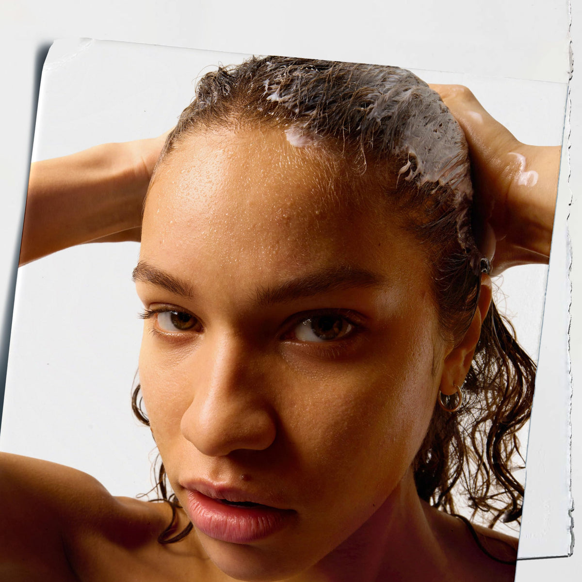 Kiehl's creamy conditioner texture close-up revealing smooth spreadability