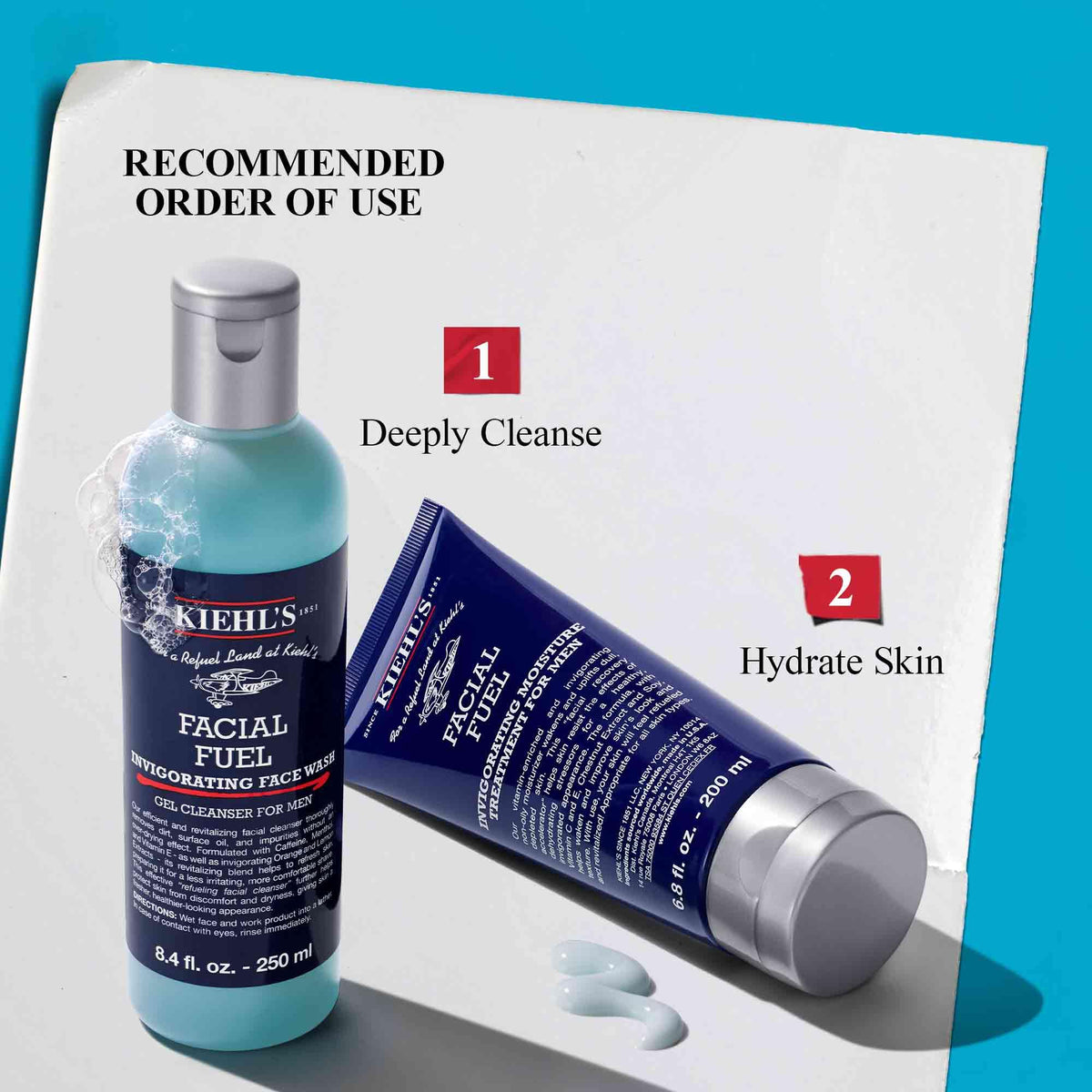 Kiehl's set held in hand to show size and travel-friendly convenience benefit