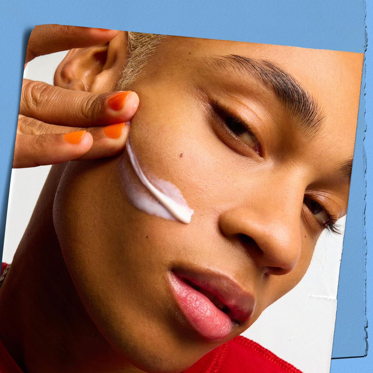 Kiehl's open jar top view showing smooth cream ready for application benefit