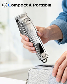 KIKIDO clipper held in hand for scale showing compact cordless portability