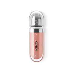 Kiko Milano tube held in hand for scale, shows compact 6.5ml size and travel convenience