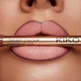 KIKO Milano lip liner in use outlining lips to enhance lipstick hold and prevent smudging