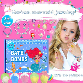 kims cosiart bath bomb fizzing in tub, colorful water and playful bubbles