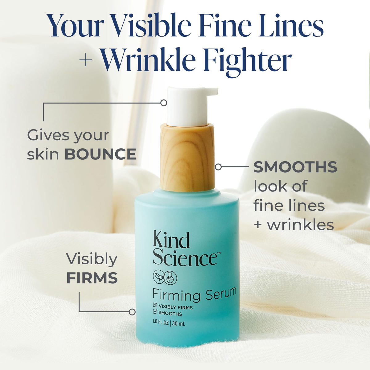 Kind Science serum droplet on fingertip showing smooth texture and hydration