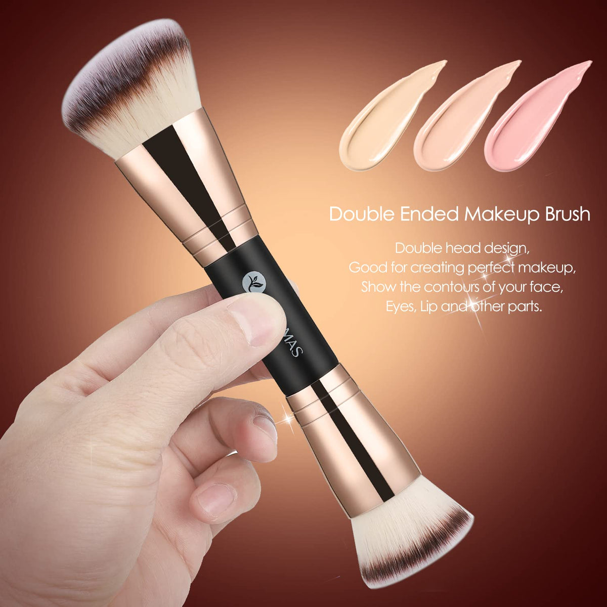 KINGMAS brush in hand to show compact travel-friendly size and control