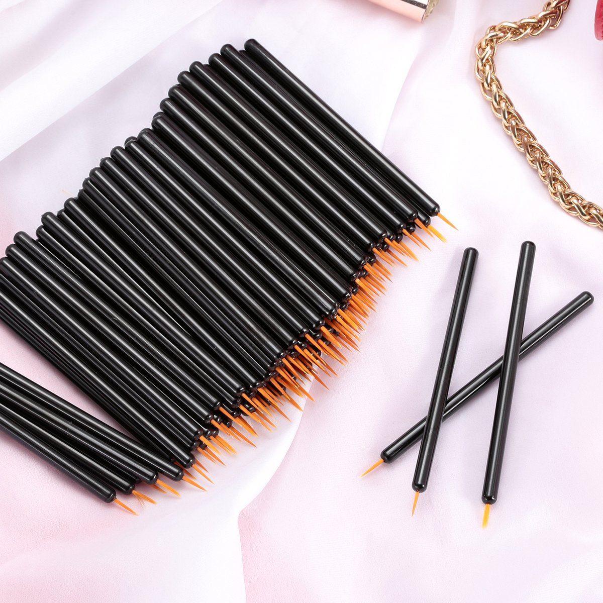 KINGMAS brushes arranged with makeup tools for professional-ready, sanitary workflow