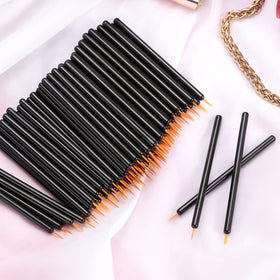 KINGMAS brushes arranged with makeup tools for professional-ready, sanitary workflow