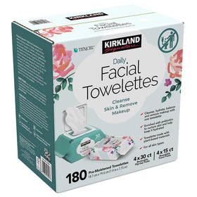 Hand using Kirkland Signature wipe on face demonstrating quick, convenient cleansing on the go