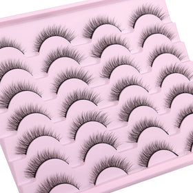 Kiromiro lashes next to a coin, scale comparison for short 10mm length