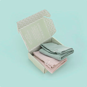 KISMETICS turbans on bathroom vanity styled as gift-ready self-care setup benefit