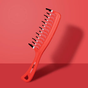 KISMETICS comb hanging on shower hook for quick drying and tidy storage