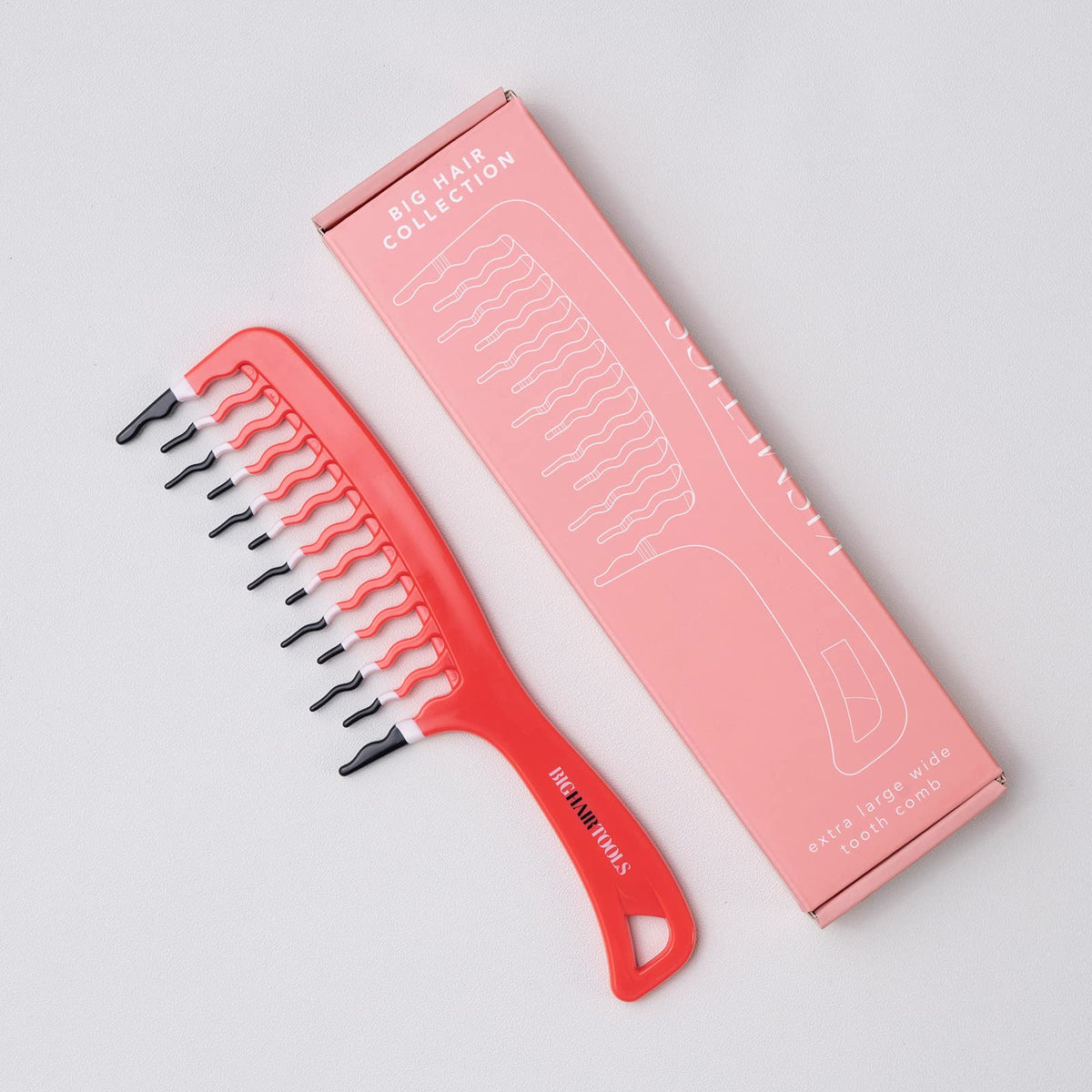 KISMETICS comb distributing conditioner through wet hair for even product coverage