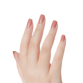 KISS applying a press-on nail showing quick secure attachment