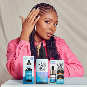 KISS Colors & Care bottle in hand illustrating small travel-friendly size