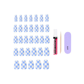 KISS 2g glue, manicure stick, and mini file displayed, everything needed for application
