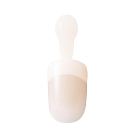 KISS hands in use applying a press-on nail for fast at-home manicure