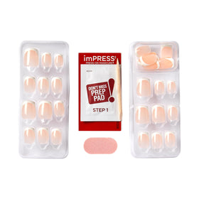 KISS hand applying press-on nail to show fast peel-and-press convenience benefit