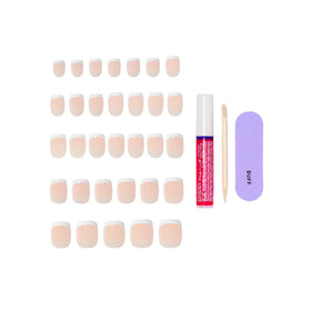 KISS 2g glue bottle with manicure stick and mini file ready for application