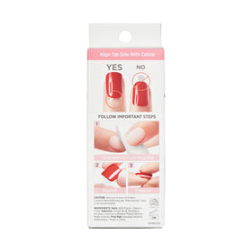 KISS press-on nails being applied by hand for quick salon-style result