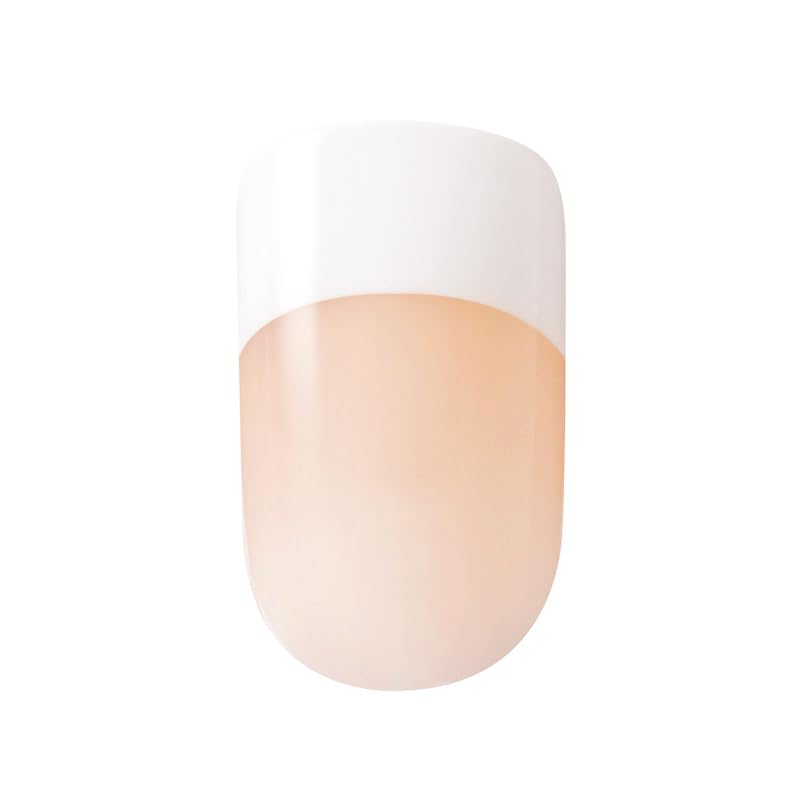 KISS nails beside ruler showing medium squoval size for accurate fit and scale