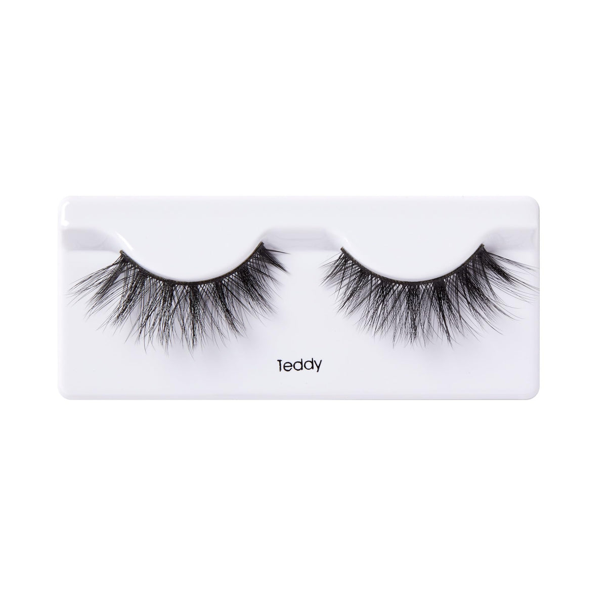 KISS Teddy shown in hand to display true size and lightweight benefit