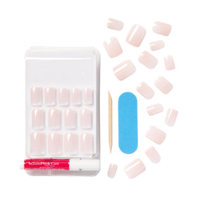 KISS hands wearing glossy pink nails at desk, professional polished appearance