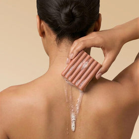 Kitsch amber shores lifestyle in shower conveying fresh woody-aquatic scent experience