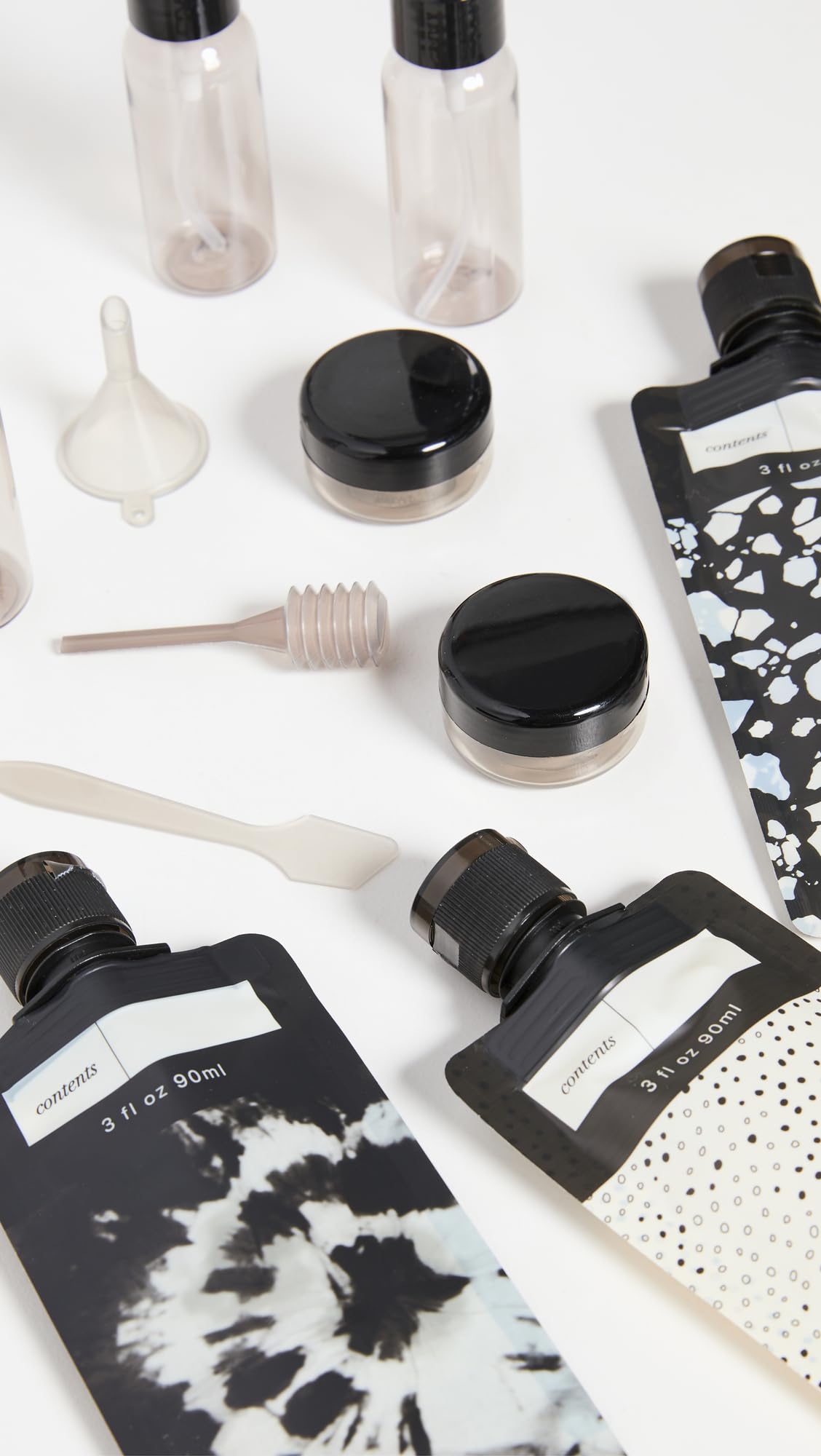 Kitsch close-up of bottles and jars highlighting durable BPA-free materials and leak protection