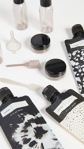 Kitsch close-up of bottles and jars highlighting durable BPA-free materials and leak protection