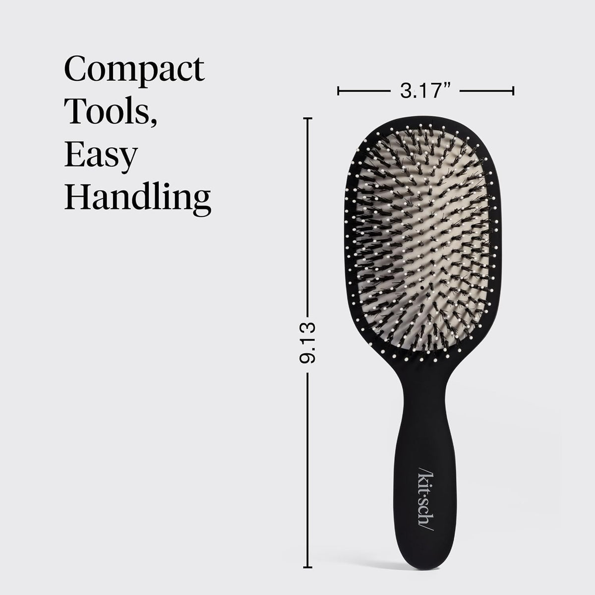 Kitsch brush in hand showing compact size and travel-friendly portability