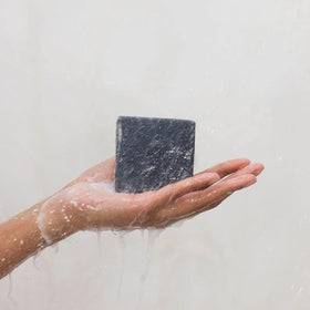 Kitsch charcoal soap packed in travel kit showing convenience benefit