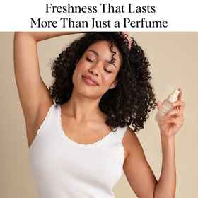 Kitsch mist spraying onto hair demonstrating quick refresh benefit