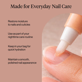 Kitsch pen applying oil on a nail bed to soften cuticles and prevent splitting