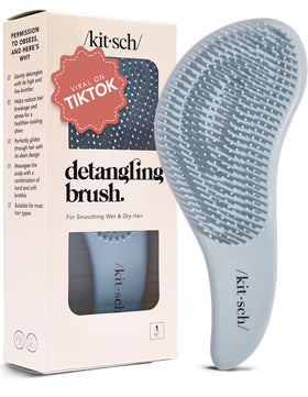 Kitsch detangler brush front view showcasing compact haze blue design and travel convenience